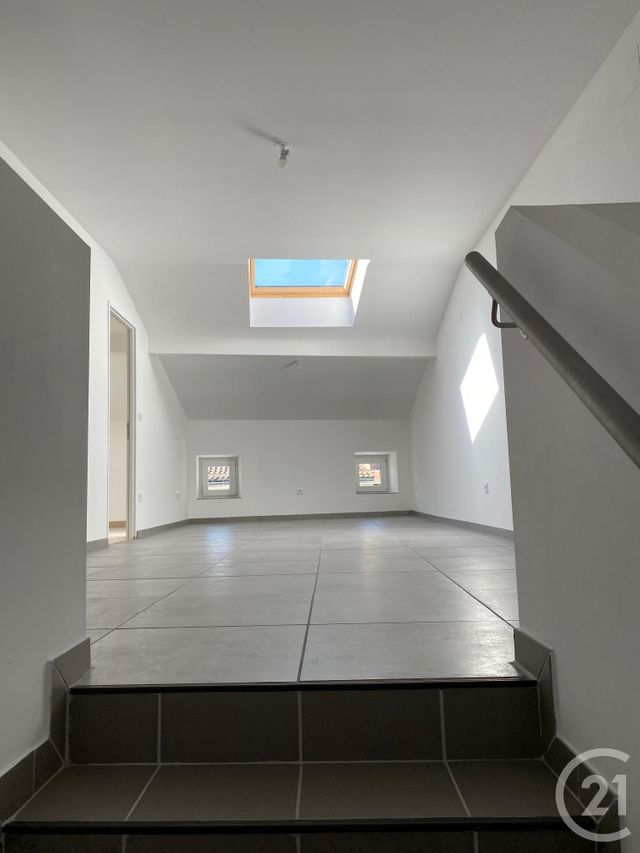 Afficher la photo en grand Appartement F4 à louer - 5 pièces - 80.1 m2 - BOULAY MOSELLE - 57 - LORRAINE - Century 21 Côté Est Immobilier