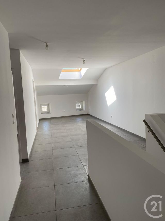 Afficher la photo en grand Appartement F4 à louer - 5 pièces - 80.1 m2 - BOULAY MOSELLE - 57 - LORRAINE - Century 21 Côté Est Immobilier